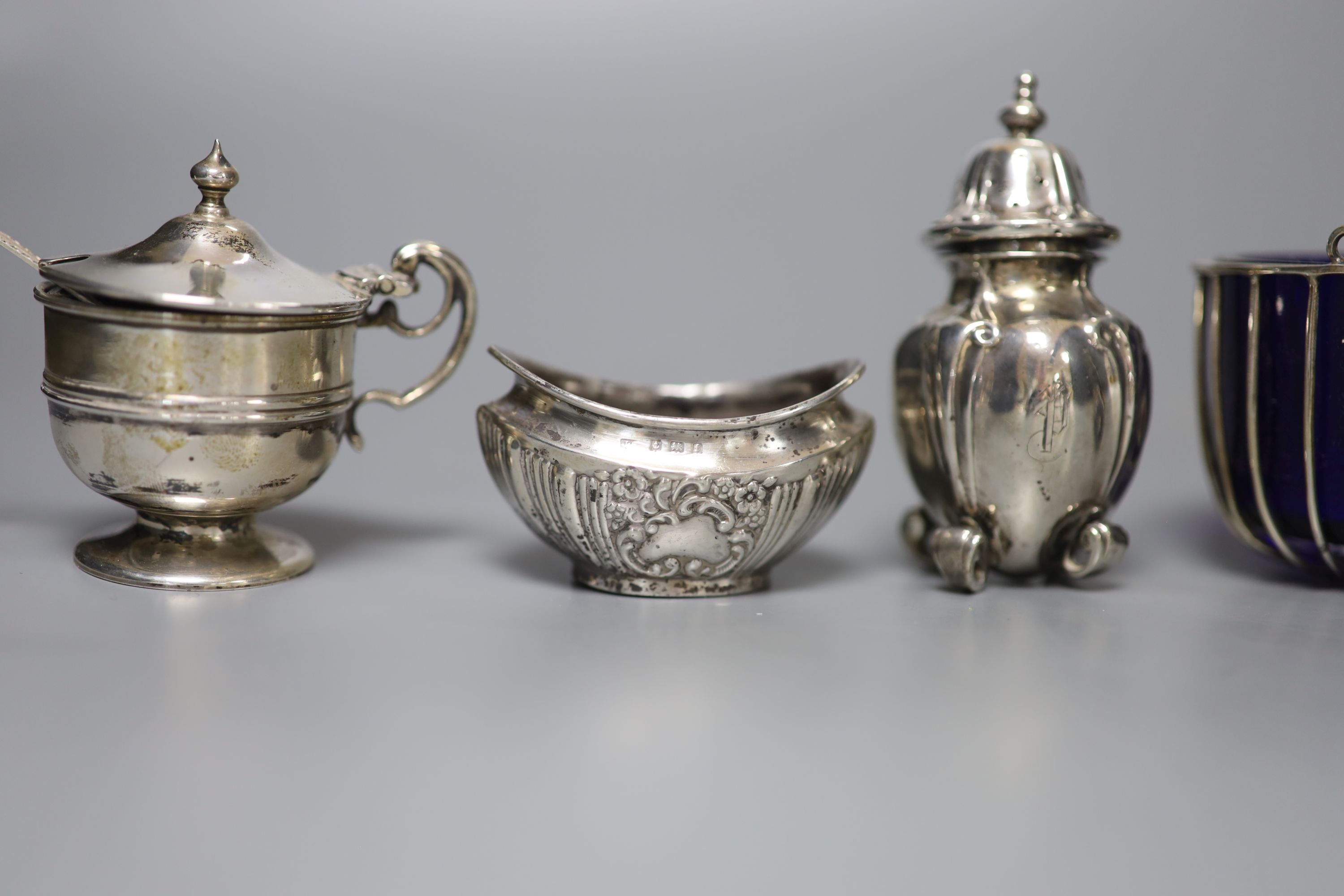 Eight assorted 20th century silver condiments including two mustard pots.
